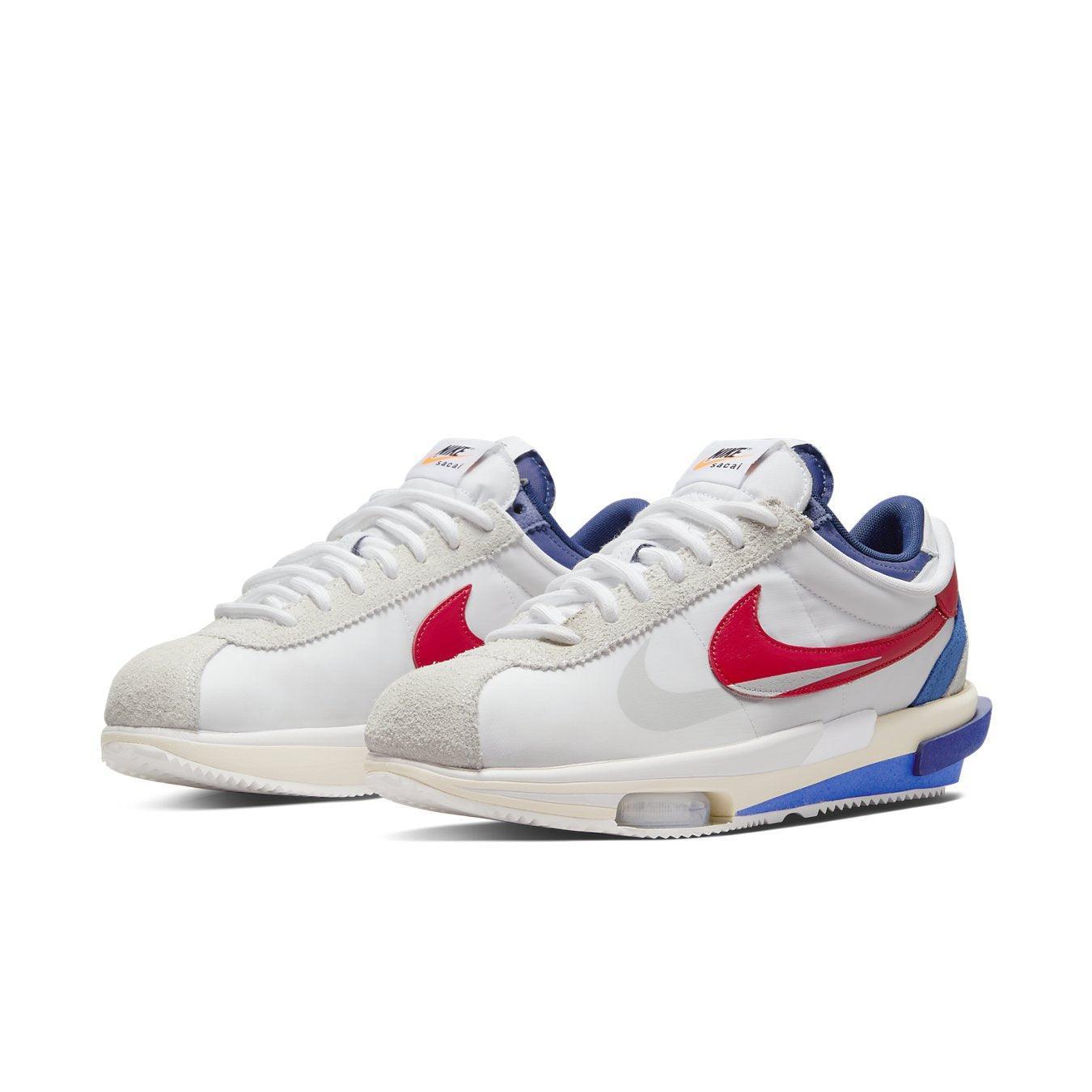 Nike Cortez 4.0 Sacai sneakers in white, red, and blue with suede and leather design, featuring Zoom Air cushioning.