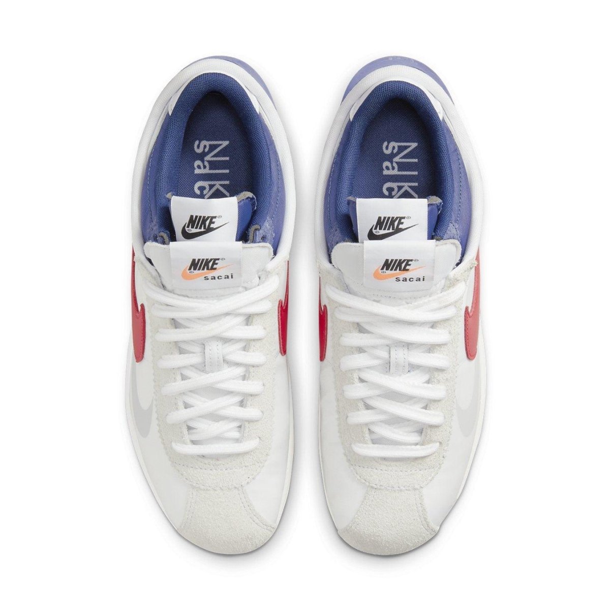 Nike Cortez 4.0 Sacai in white, university red, and blue, featuring layered suede and leather design.