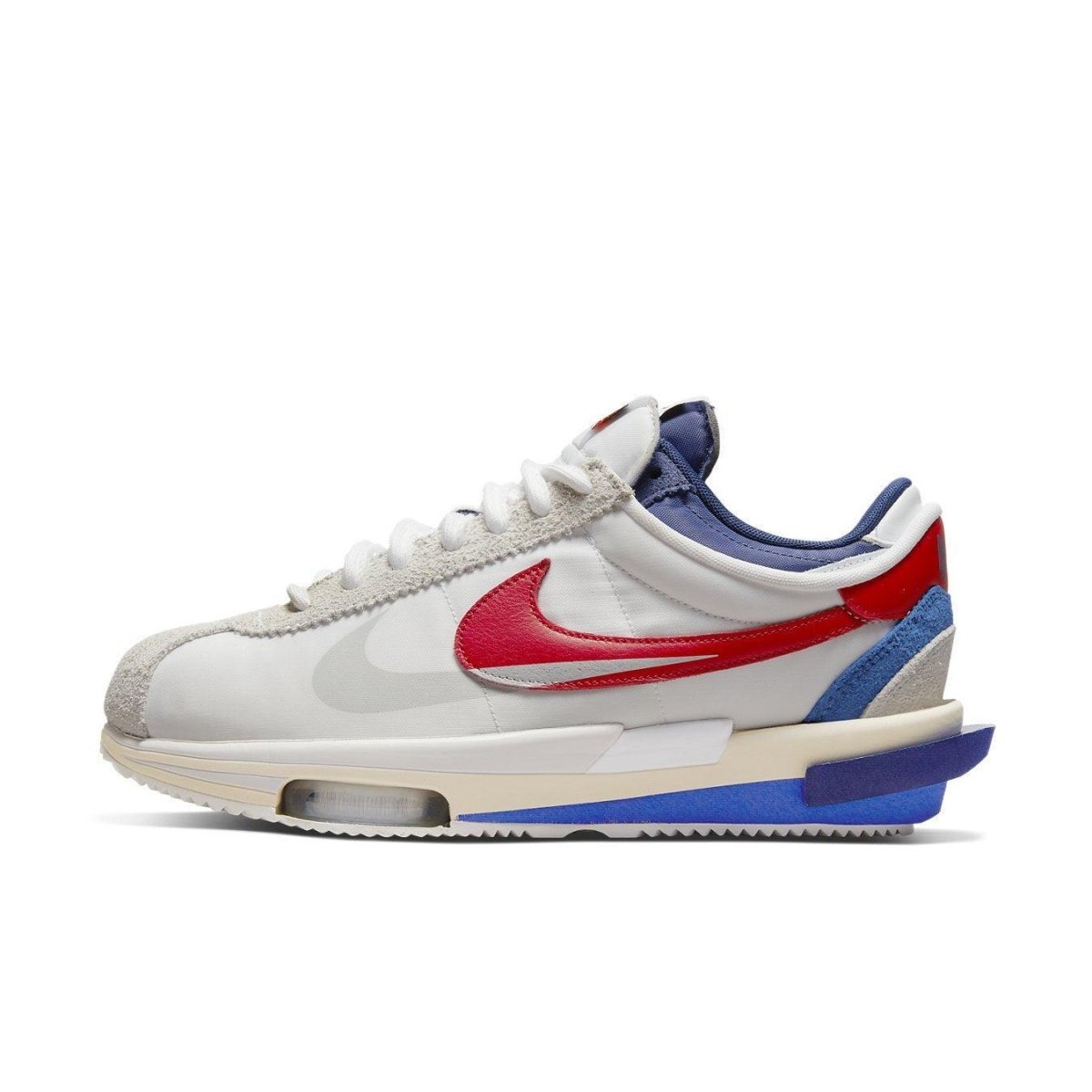 Nike Cortez 4.0 Sacai sneaker in white, red, and blue, featuring a unique double-layered design and visible Zoom Air unit.
