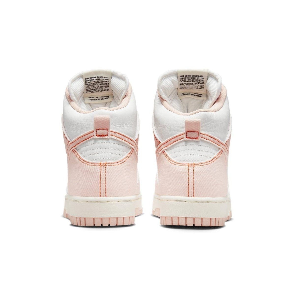 Back view of Nike Dunk High 1985 Arctic Orange sneakers showcasing soft pink and white design elements.
