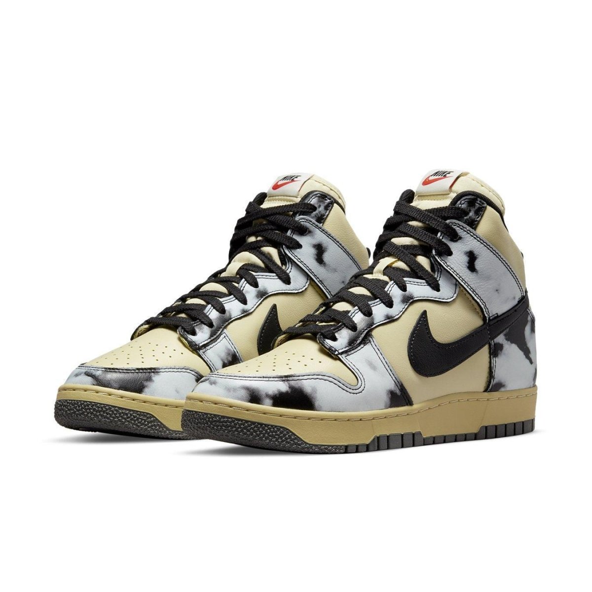 Nike Dunk High 1985 Black Acid Wash sneakers featuring a unique black and cream design with signature Nike Swoosh.