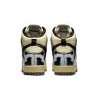 Nike Dunk High 1985 in black and cream with cow print design, showcasing the back view of the sneaker.