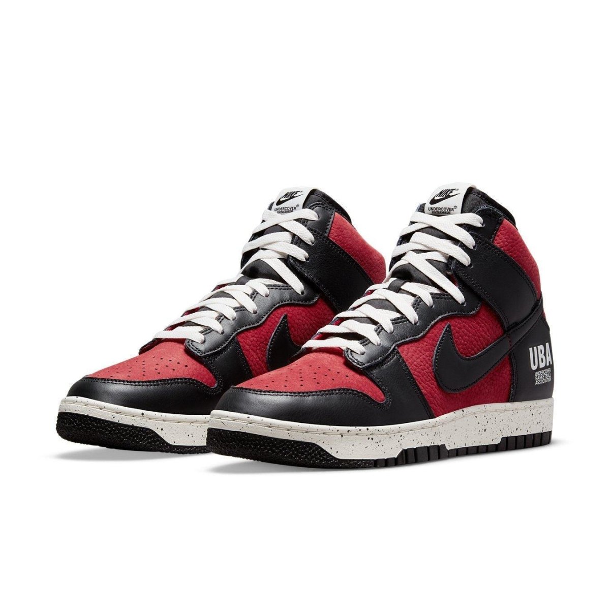 Nike Dunk High 1985 Undercover UBA in red nubuck and black leather, featuring classic 80s design and Undercover branding.