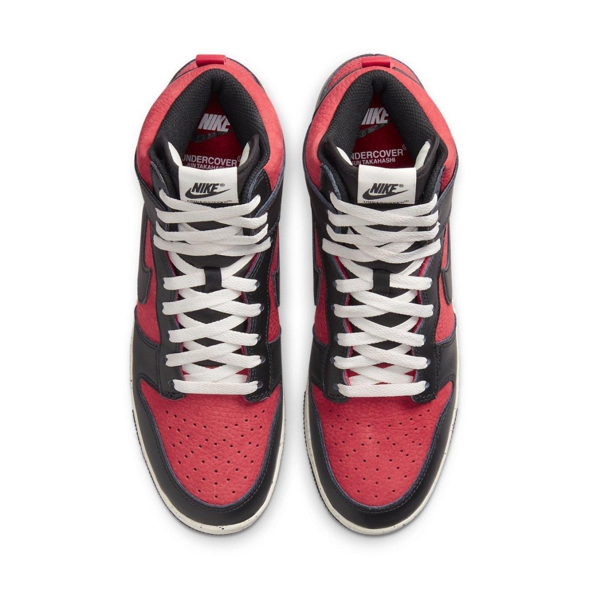 Nike Dunk High 1985 Undercover UBA with red nubuck and smooth black leather, top view showing intricate lacing and design.