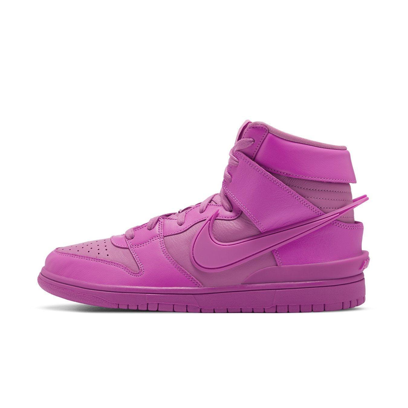 Nike Dunk High Ambush in vibrant Cosmic Fuchsia with a sculpted Swoosh and extra-high tongue for a bold look.