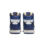 Nike Dunk High AMBUSH Deep Royal sneakers, featuring blue and white leather upper with logo and distinctive design.