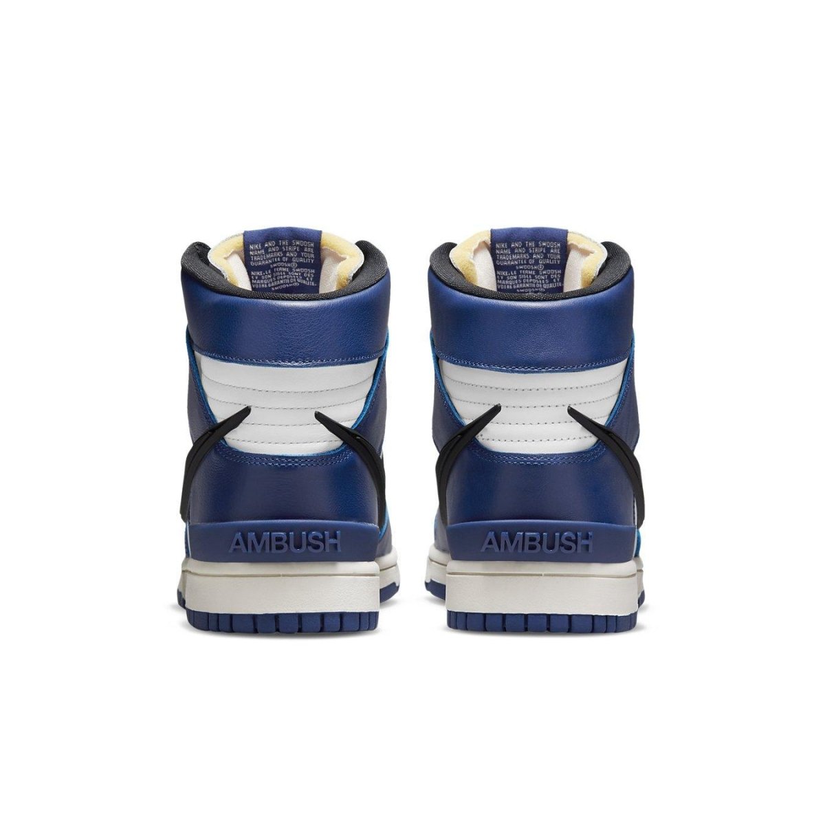 Nike Dunk High AMBUSH Deep Royal sneakers, featuring blue and white leather upper with logo and distinctive design.