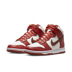 Nike Dunk High LXX Cinnabar (W) sneakers featuring red and white colorway with classic high-top silhouette.