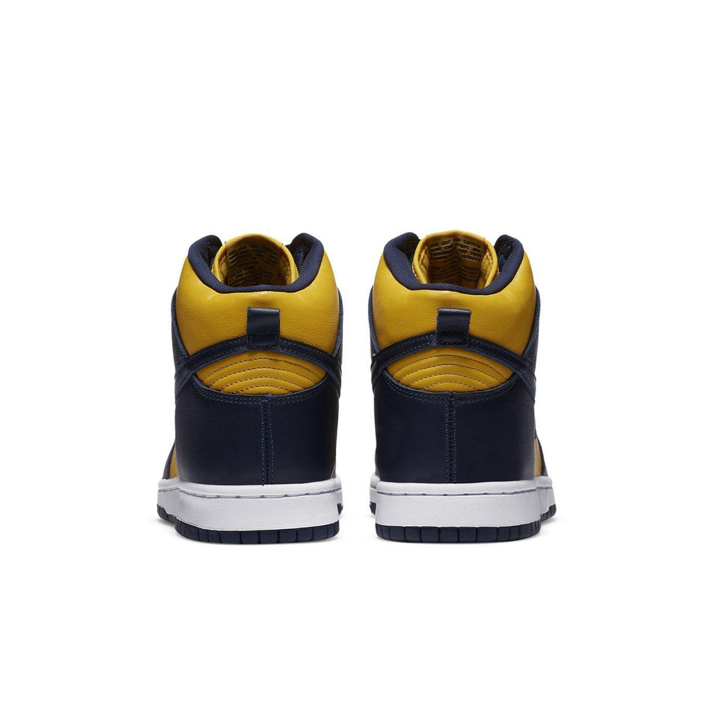 Nike Dunk High Michigan 2020 sneakers back view highlighting yellow leather and navy overlays.