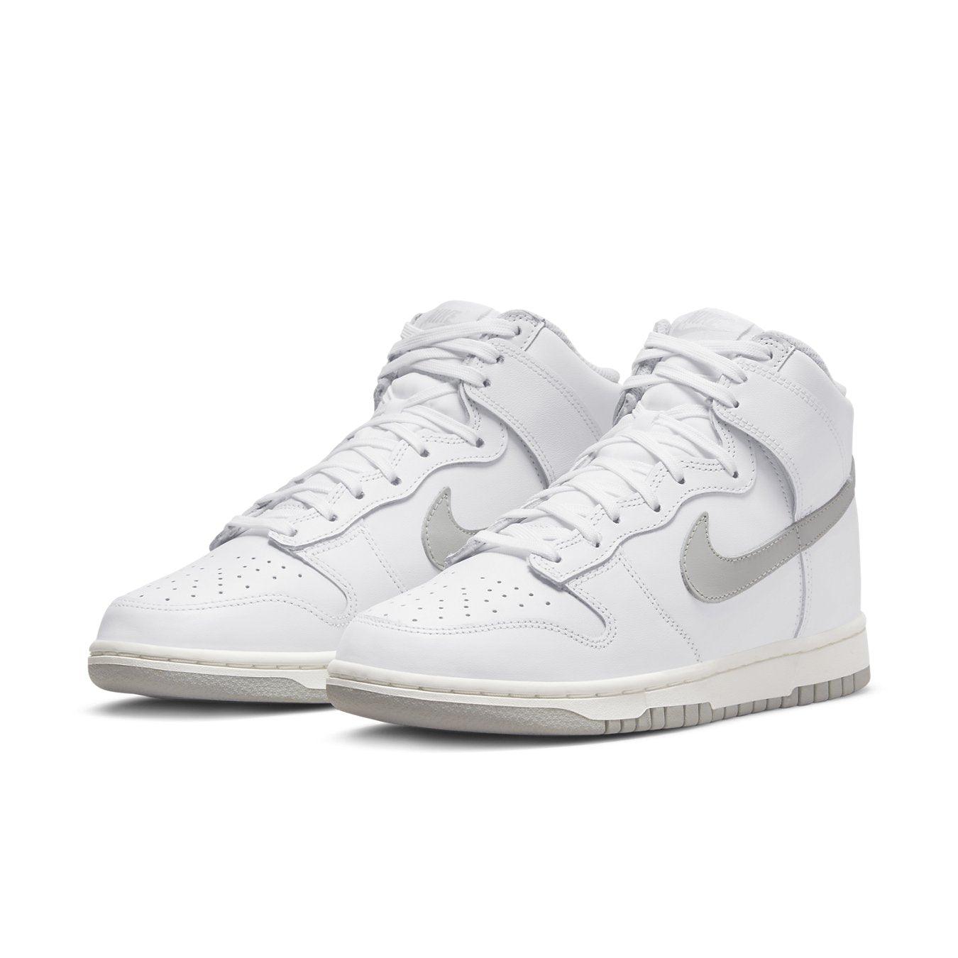 Nike Dunk High Neutral Grey Women's sneaker in white leather with pastel grey Swoosh and matching sole.