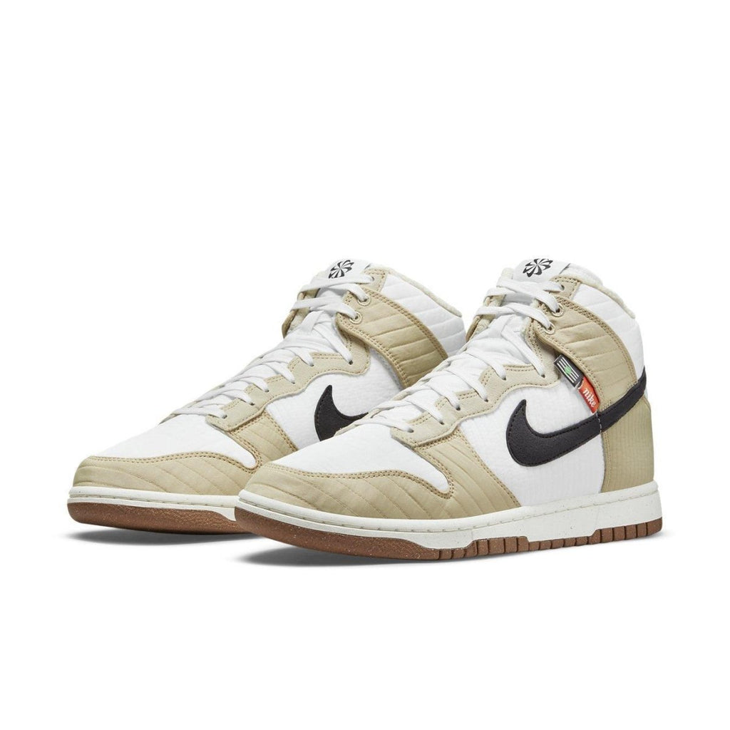 Nike Dunk High Retro Toasty Rattan shoes with quilted upper and black swoosh, ideal for outdoor adventures.