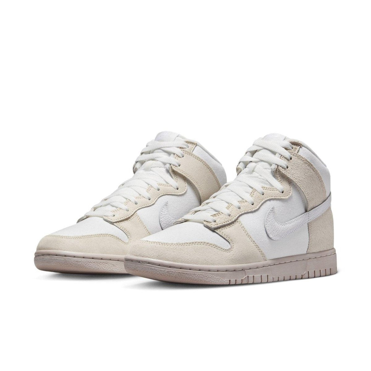 Nike Dunk High Retro PRM Cracked Leather Swoosh in light pink and white leather with contrast rubber sole.