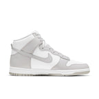 Nike Dunk High Retro in white and vast grey with a sleek high-top design, perfect for sport and street style.