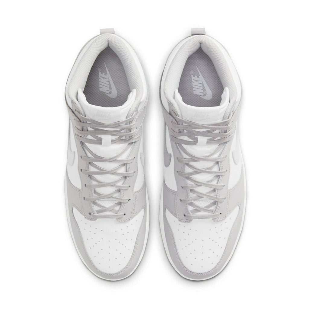 Nike Dunk High Retro White Vast Grey 2021 top view showcasing sleek design and light grey accents.