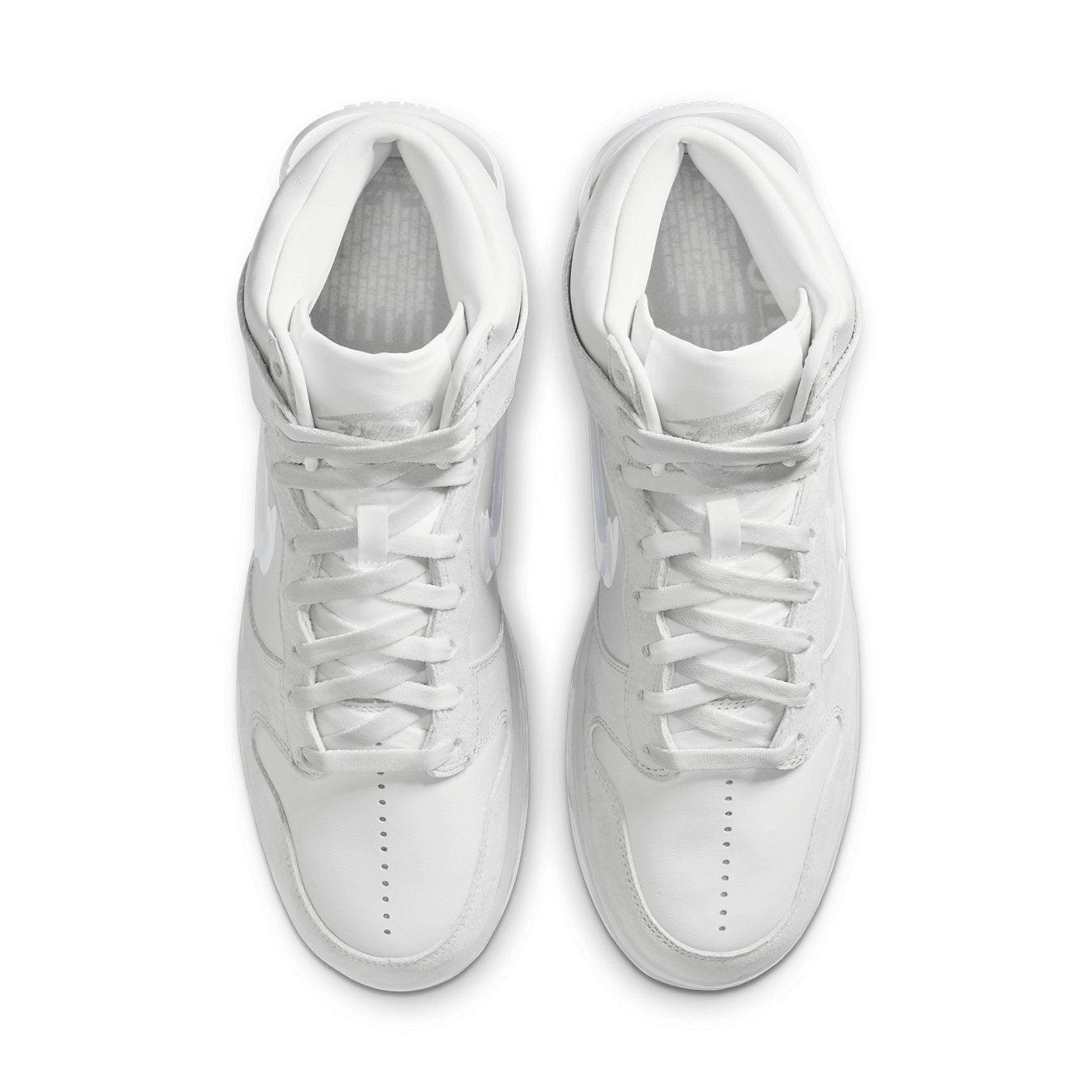 Nike Dunk High Slam Jam sneakers in white and pure platinum, featuring a sleek design and classic silhouette from above.