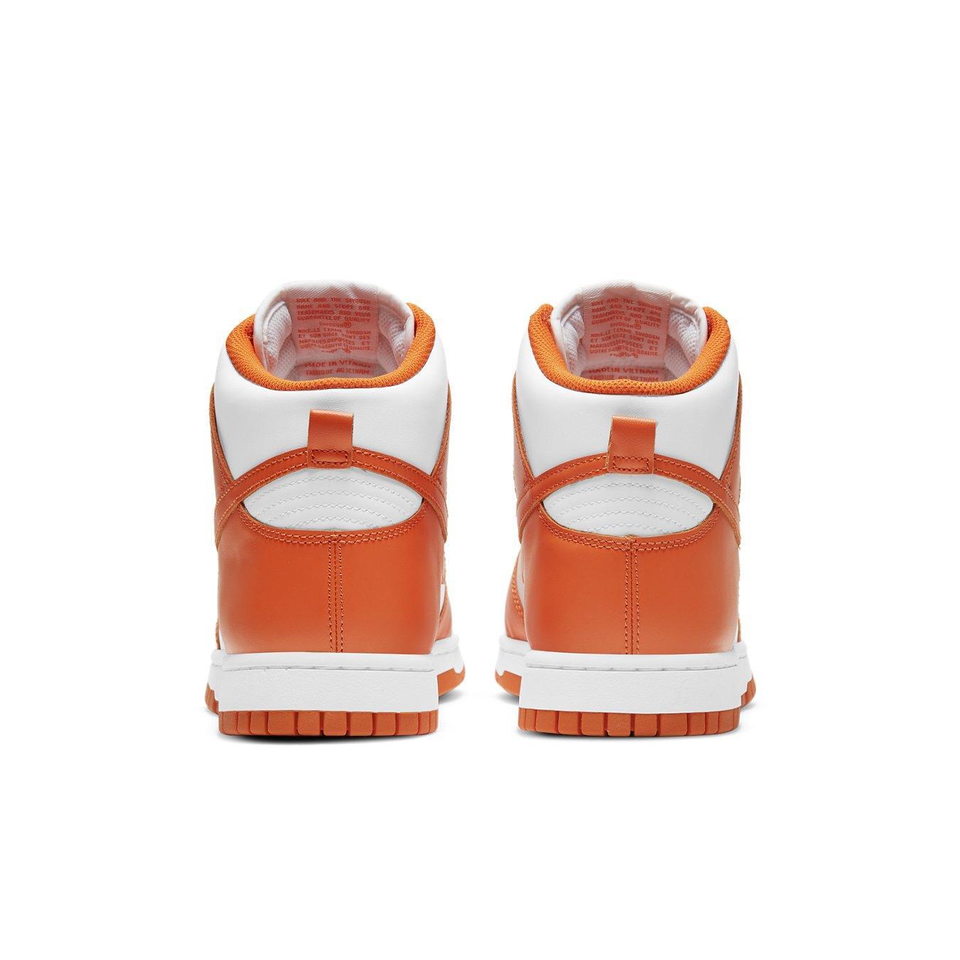 Nike Dunk High Syracuse 2021 sneakers, featuring white leather and vibrant Orange Blaze accents from the back view.