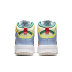 Nike Dunk High Up Pastels women's sneakers in Cashmere Coral featuring vibrant pastel colors and a unique design.