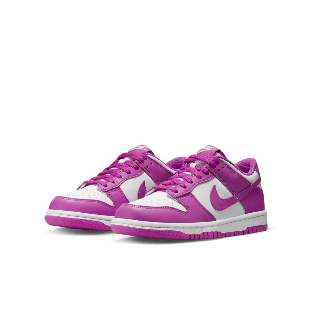Nike Dunk Low Active Fuchsia GS sneaker with smooth leather overlays in vibrant pink.