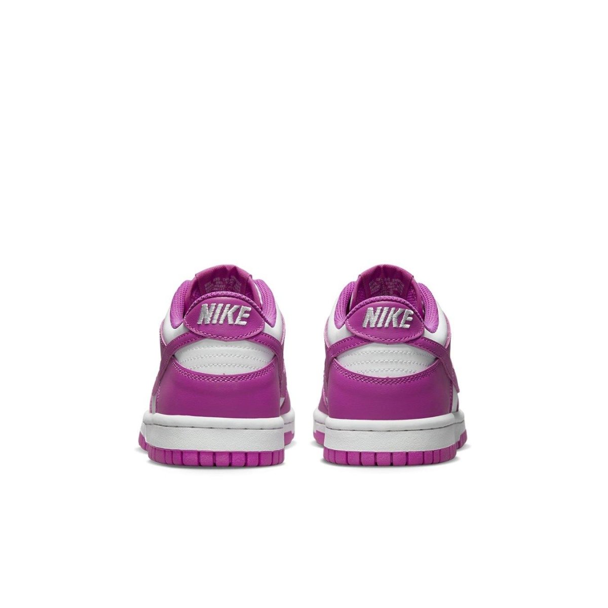 Retro view of Nike Dunk Low Active Fuchsia sneakers showcasing vibrant fuchsia leather and white mesh accents.