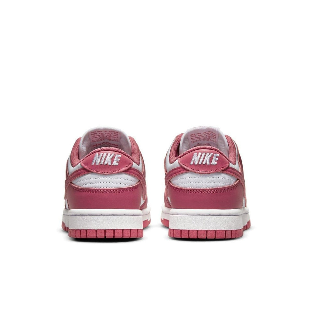 Nike Dunk Low Archeo Pink women's sneakers, featuring a white and pink leather design with contrasting laces.
