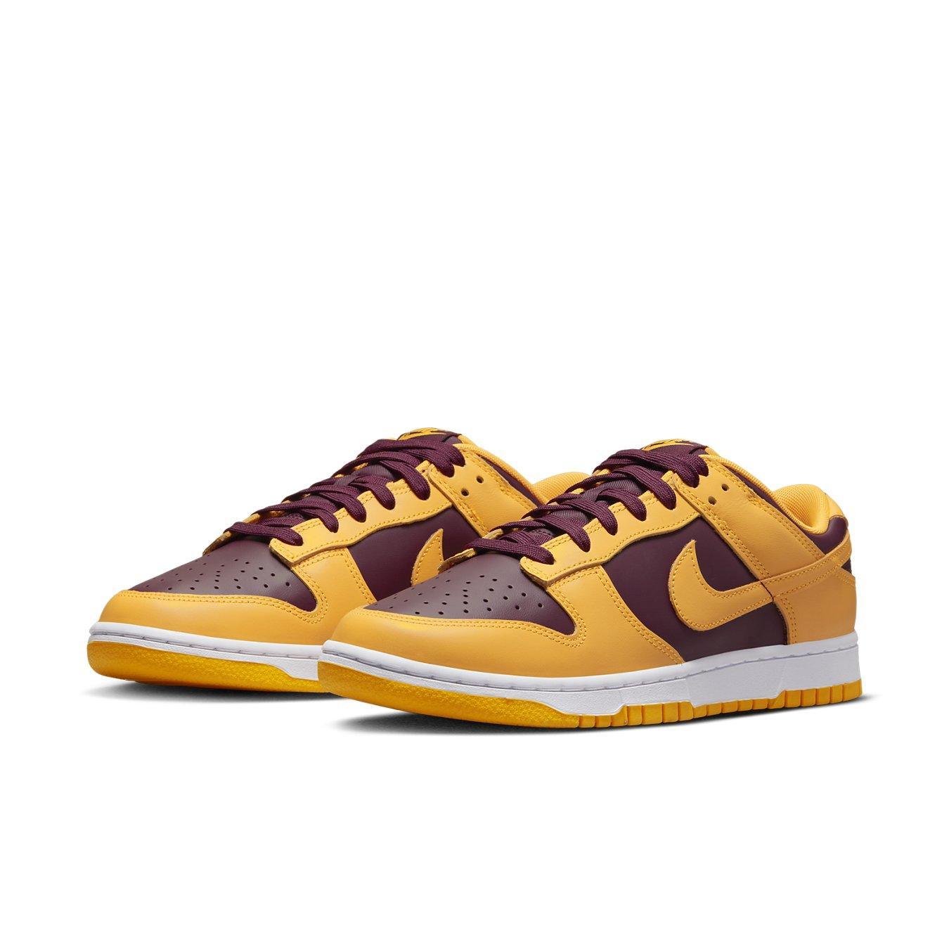 Nike Dunk Low Arizona State sneakers in bicolored bordeaux and gold, showcasing perforated toe and signature Swoosh.