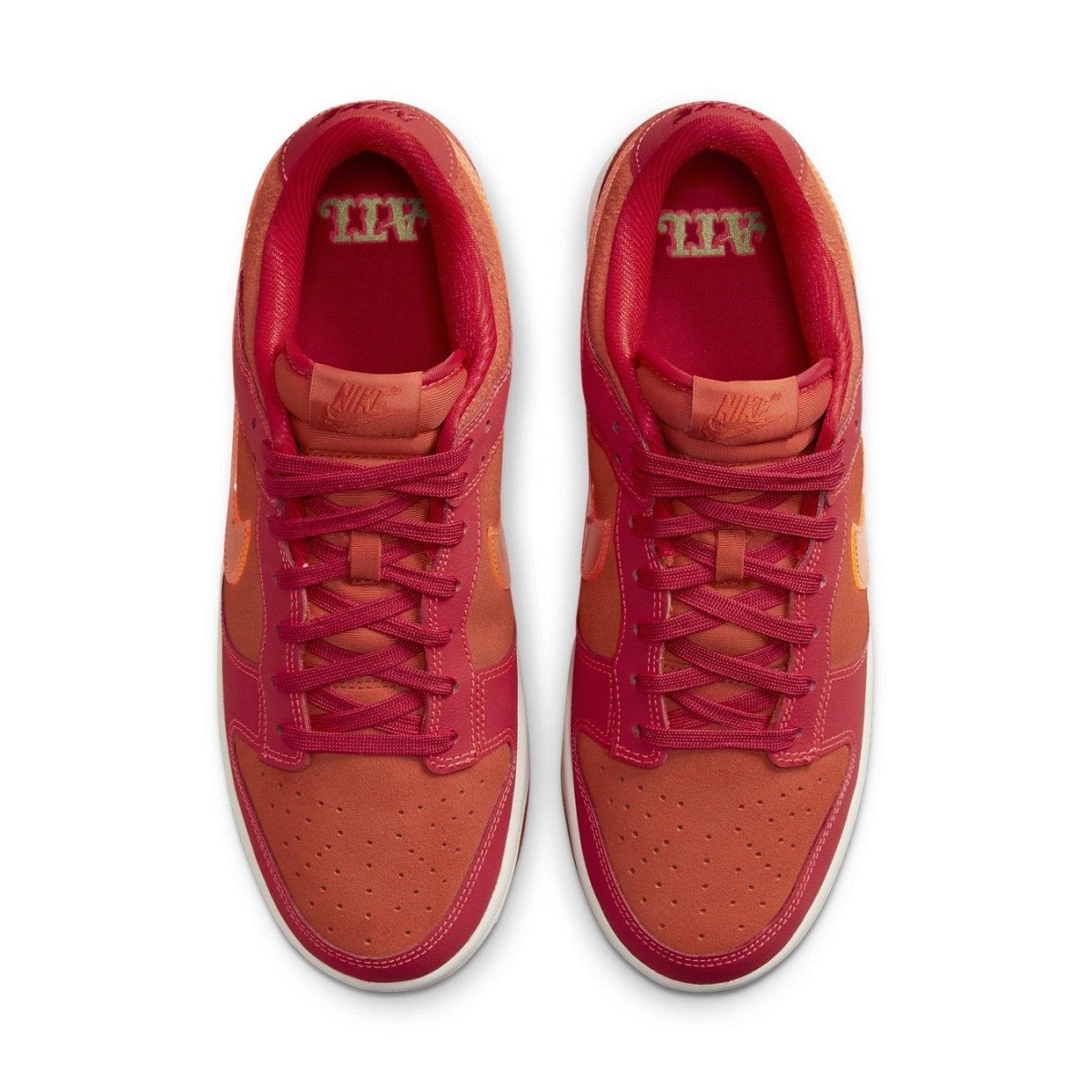 Nike Dunk Low ATL shoes in Picante Red and University Red with Bright Crimson accents celebrating hip hop's anniversary.