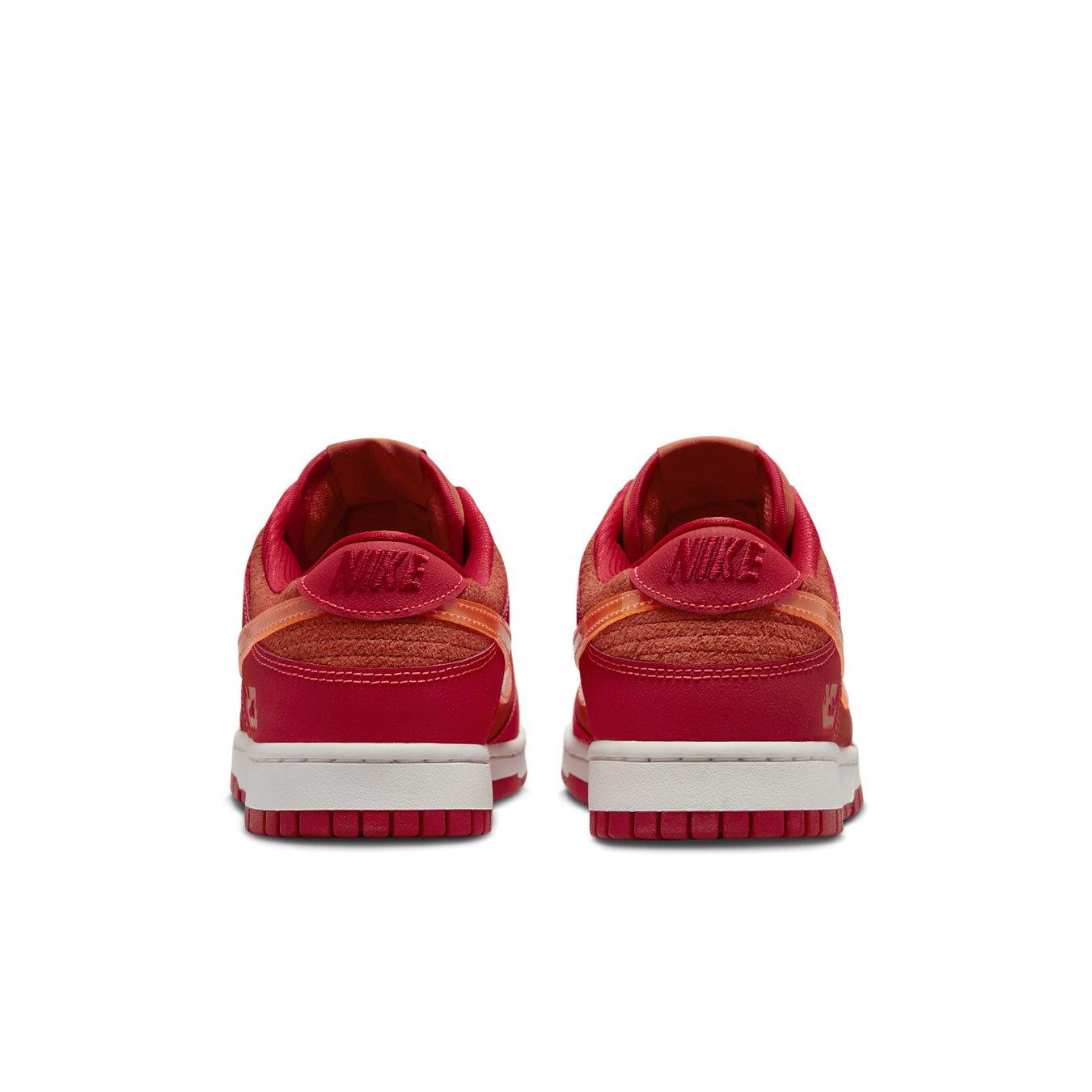 Nike Dunk Low ATL sneakers in Picante Red and University Red with Bright Crimson detailing from the back view.