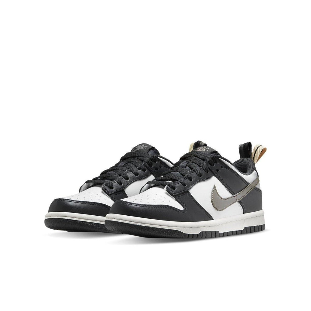 Nike Dunk Low Black White Metallic (GS) sneakers featuring a white leather base with black overlays.