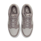 Nike Dunk Low Bone Beige (W) sneakers top view showcasing minimalist design and soft color palette.