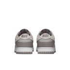 Nike Dunk Low Bone Beige (W) rear view showcasing minimalistic design and soft color palette.