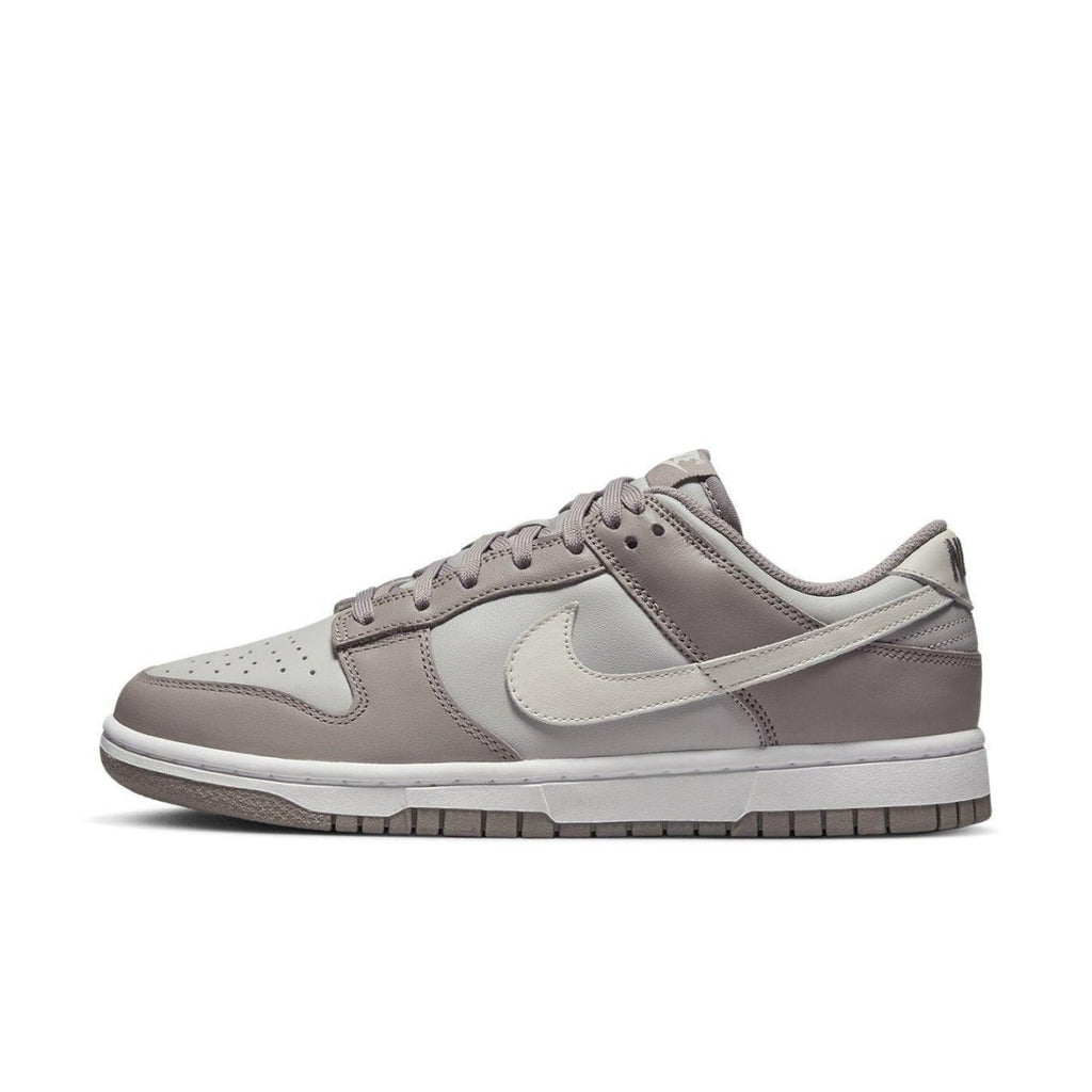Nike Dunk Low Bone Beige sneaker featuring minimalistic grey and beige colorway.