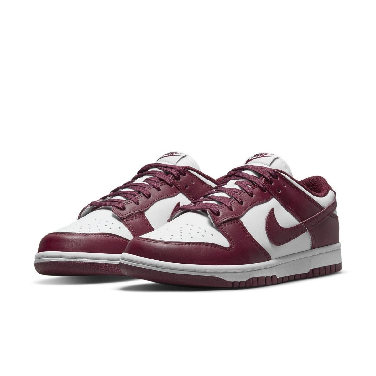 Nike Dunk Low Bordeaux women's sneakers featuring a maroon and white colorway with Swoosh logo.