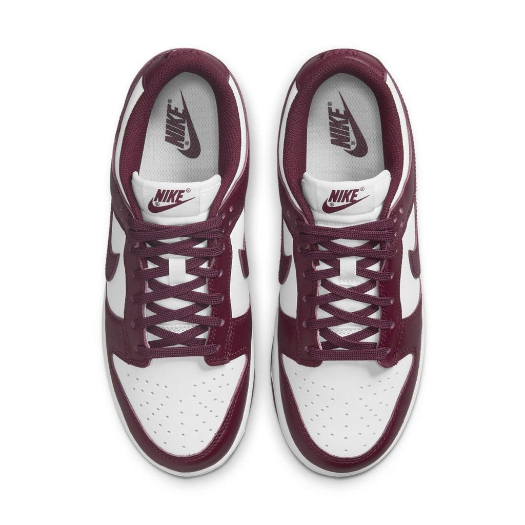 Nike Dunk Low Bordeaux sneakers featuring smooth burgundy and white leather, designed for modern street style.