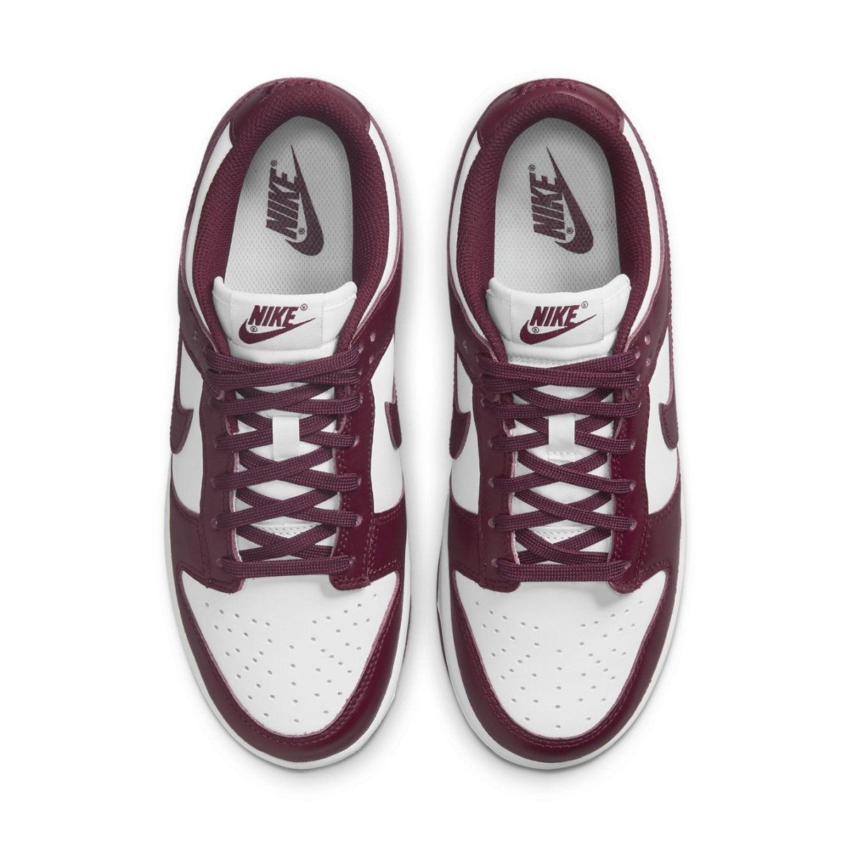 Nike Dunk Low Bordeaux sneakers featuring smooth burgundy and white leather, designed for modern street style.
