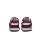Nike Dunk Low Bordeaux (W) sneakers in bordeaux leather with white accents, showcasing the back view and iconic Swoosh logo.