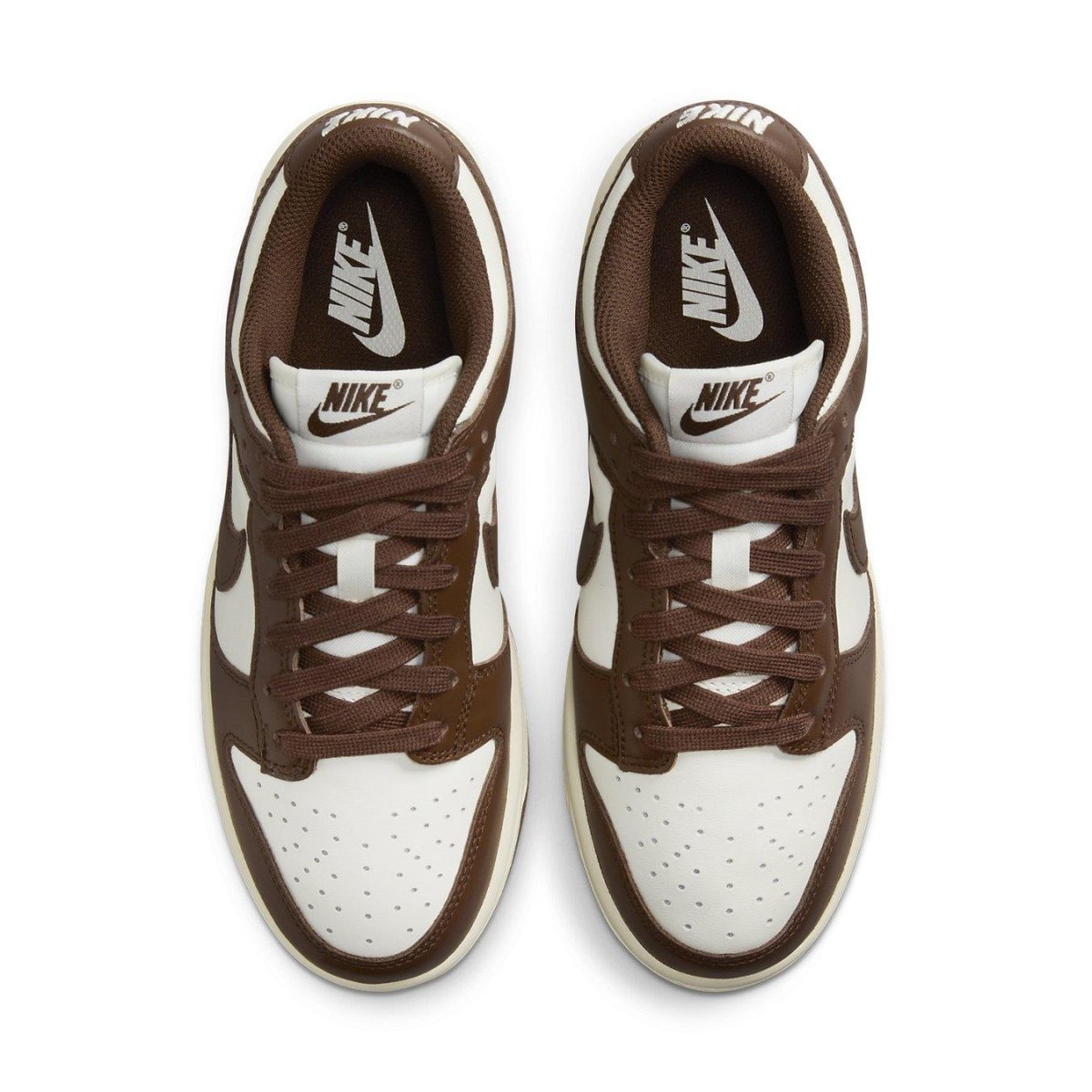 Nike Dunk Low Cacao Wow women's sneakers in white and chocolate brown with classic Nike branding.