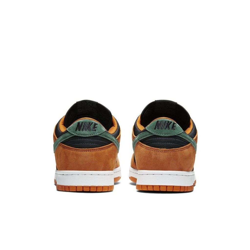 Nike Dunk Low Ceramic 2020 sneakers featuring black, green, and ceramic colorway with suede material and Nike branding.