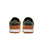 Nike Dunk Low Ceramic 2020 sneakers featuring black, green, and ceramic colorway with suede material and Nike branding.