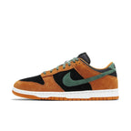 Nike Dunk Low Ceramic 2020 sneaker in black, green, and terracotta suede, featuring stylish design and logo detailing.