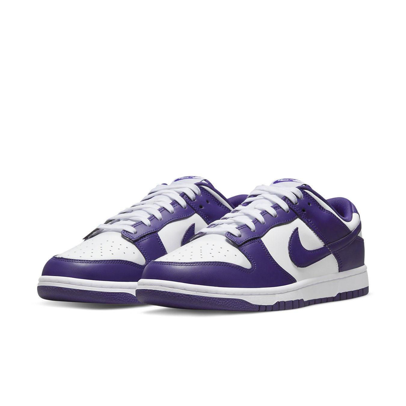 Nike Dunk Low Championship Purple with white and purple leather design, featuring a low collar and comfortable fit.