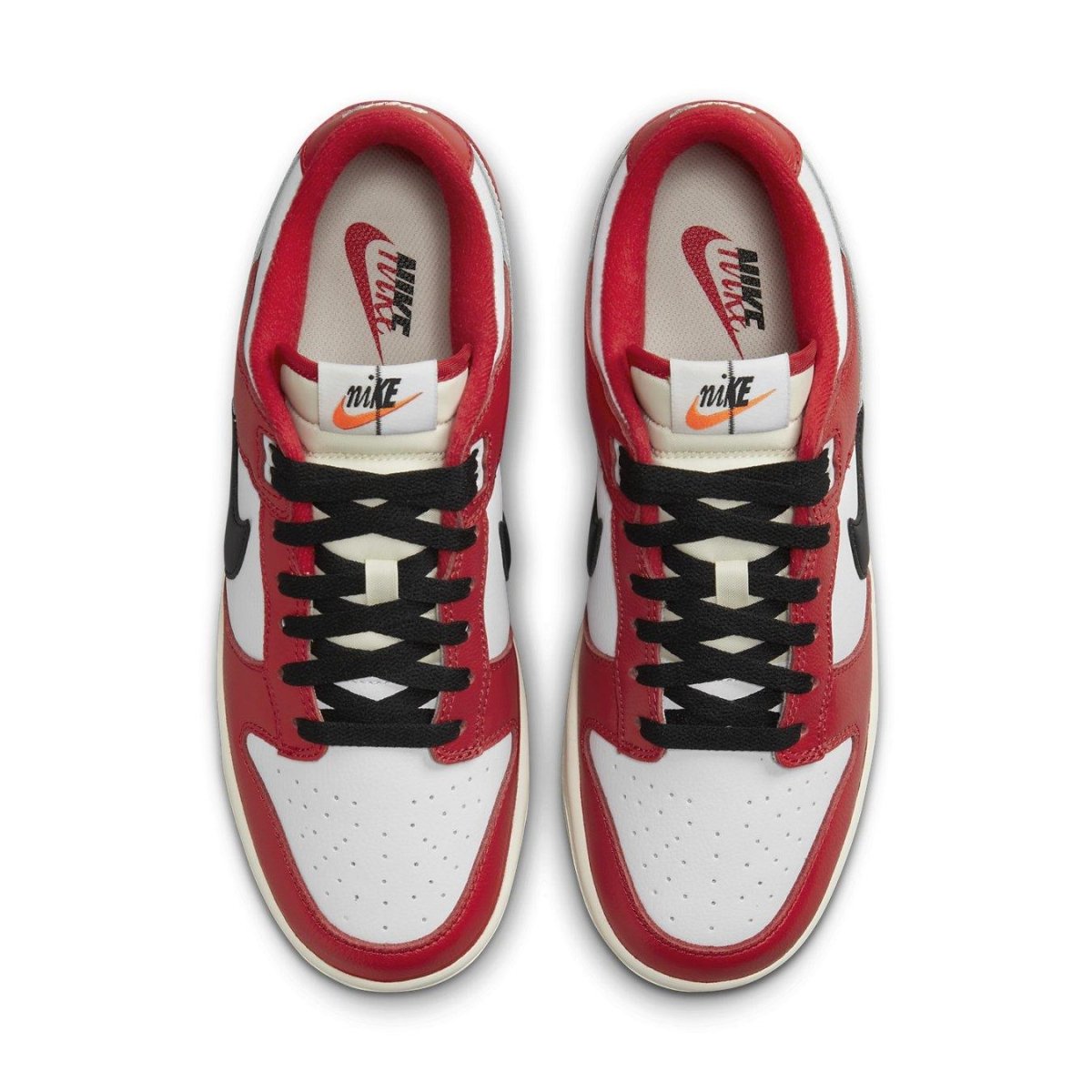 Nike Dunk Low Chicago Split sneakers featuring white leather base and red overlays.
