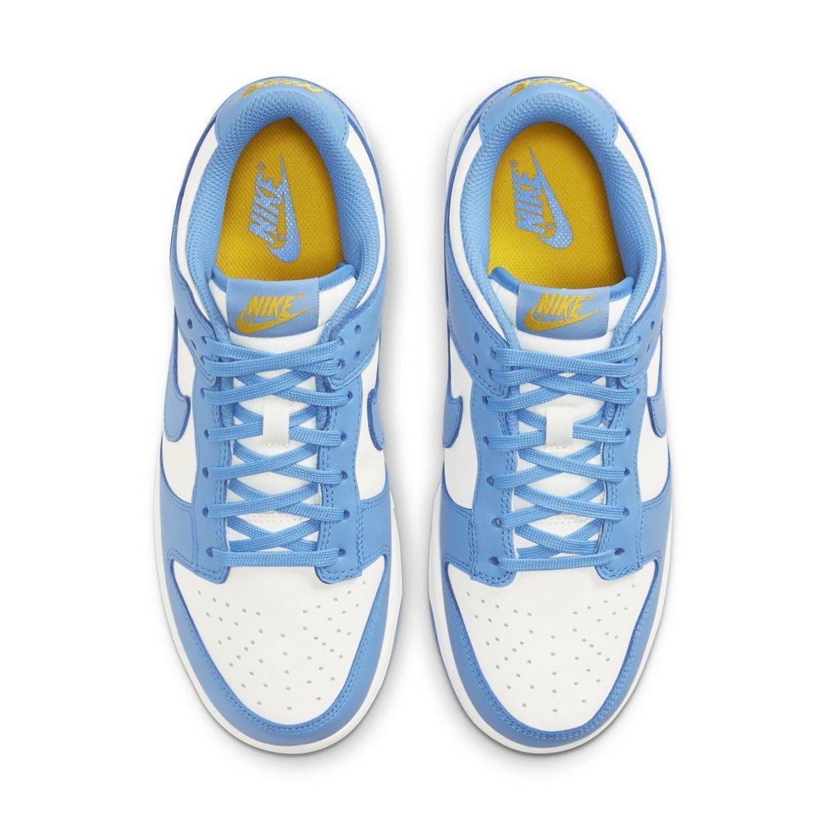 Nike Dunk Low Coast (W) sneakers in blue and white, featuring a classic design and vibrant yellow accents.