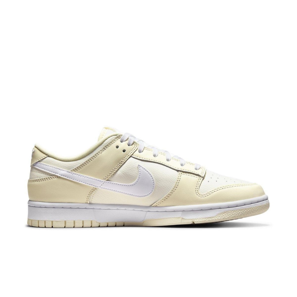 Nike Dunk Low Coconut Milk side view featuring cream leather upper and iconic Swoosh logo.