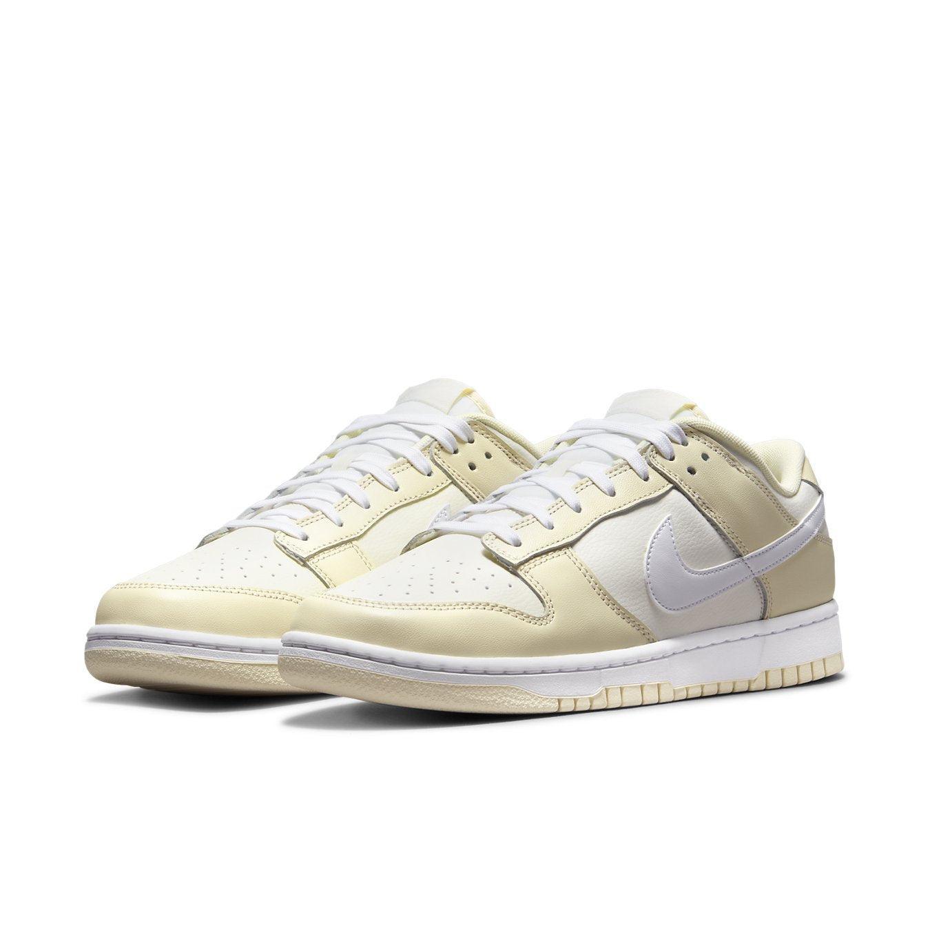 Nike Dunk Low Coconut Milk sneakers featuring smooth cream and coconut milk overlays with a classic Swoosh design.