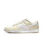 Nike Dunk Low Coconut Milk in cream and coconut milk tones, featuring smooth and perforated leather.