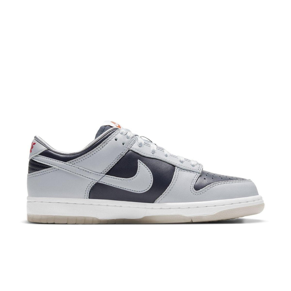 Nike Dunk Low College Navy Grey sneaker in a side view, featuring bold color blocking and sporty design.