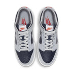 Nike Dunk Low College Navy Grey (W) top view showing navy and grey colorway with perforated toe and branded details.