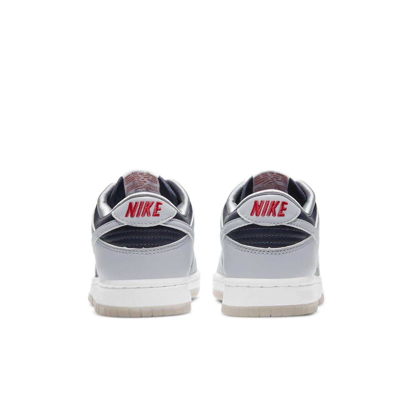 Nike Dunk Low College Navy Grey (W) rear view featuring sleek design and bold color blocking