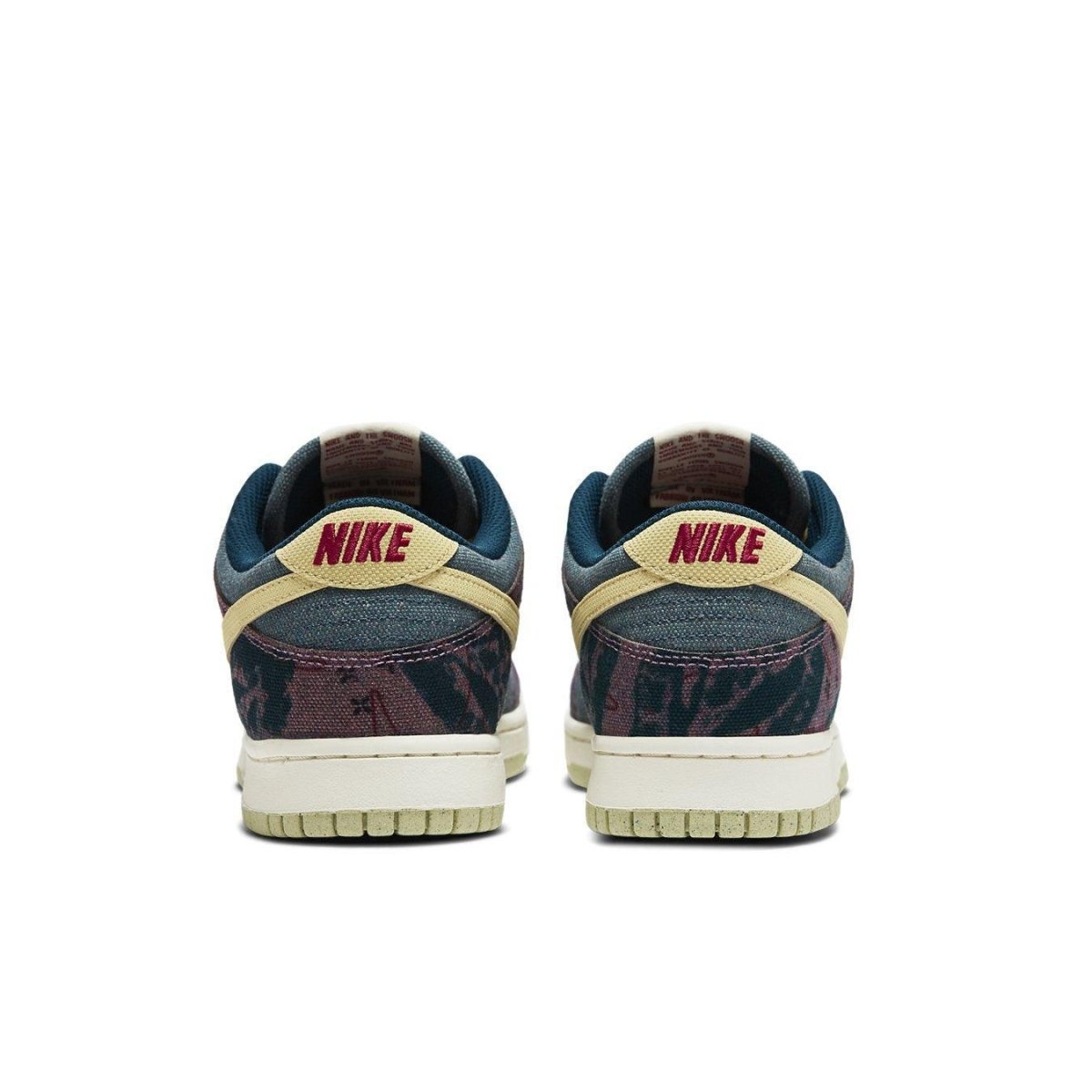 Nike Dunk Low Community Garden sneakers, featuring a unique collage design in earthy tones.