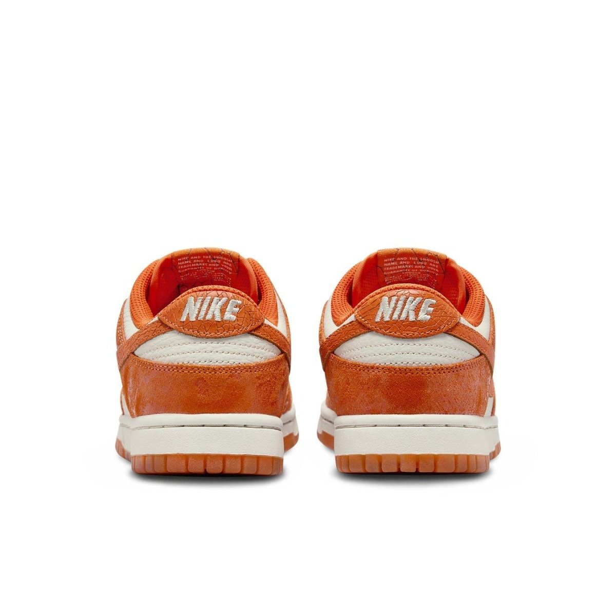 Nike Dunk Low Cracked Orange women's sneakers, showcasing the back view with vibrant Total Orange accents.